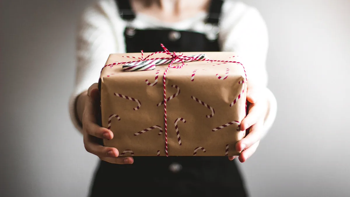 holiday marketing calendar: beautifully wrapped holiday gift boxes on wooden background