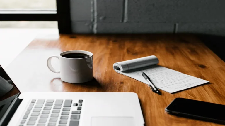 How to Side Hustle While Working Full Time: 15-Hour Plan side hustle while working full time: early morning workspace desk with laptop, coffee, and daily schedule planner